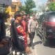 Bhabinkamtibmas Singakerta Bersinergi dengan Pecalang Amankan Upacara Ngaben